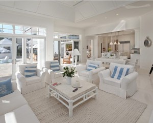 White slipcovers never go out of style on the beach.
